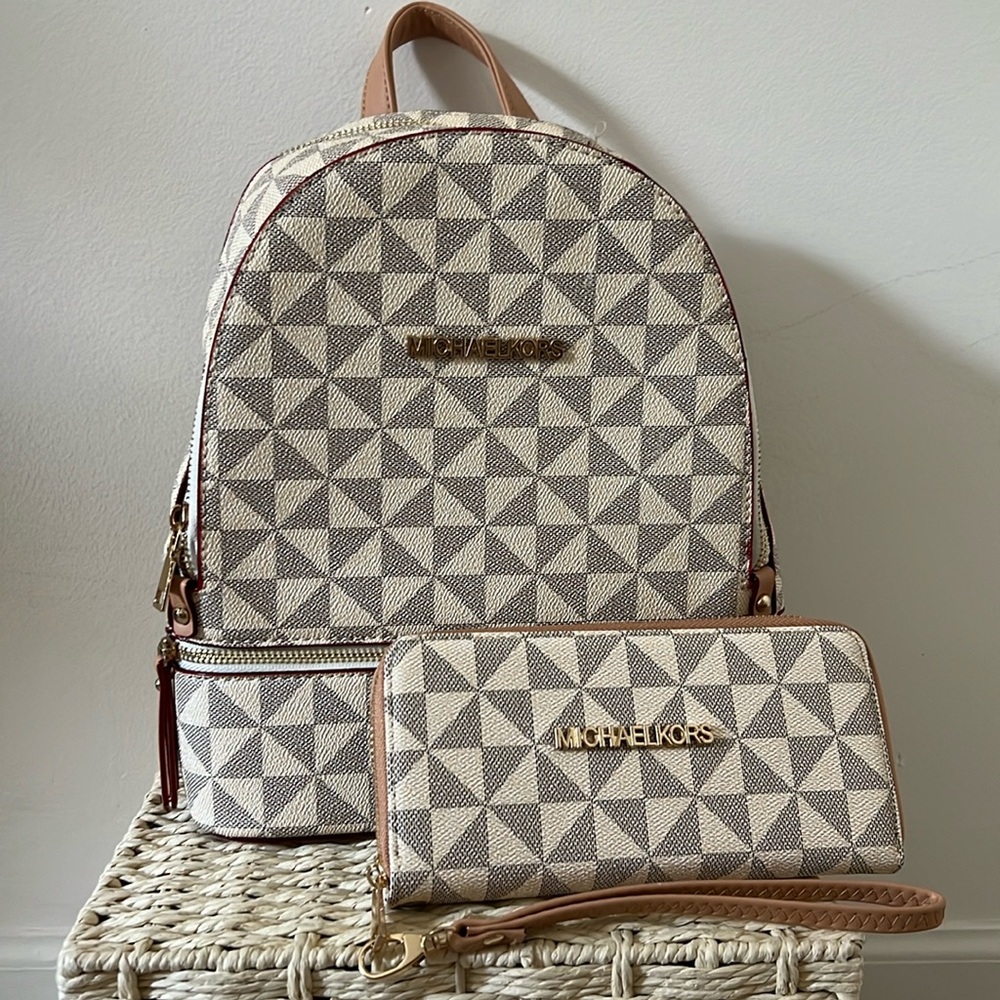 Brand new Michael Kors **inspired** backpack and matching wallet.
